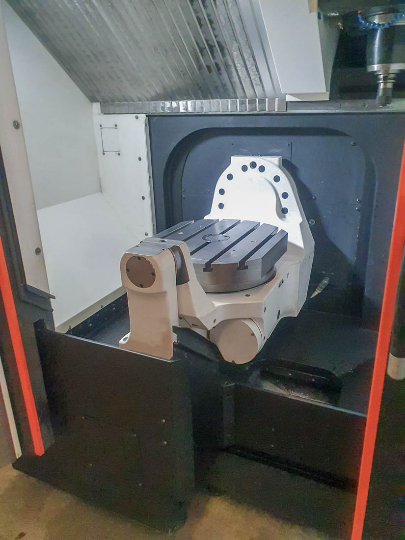 5-axis machining center with rotary table — trunnion kinematics in the work envelope
